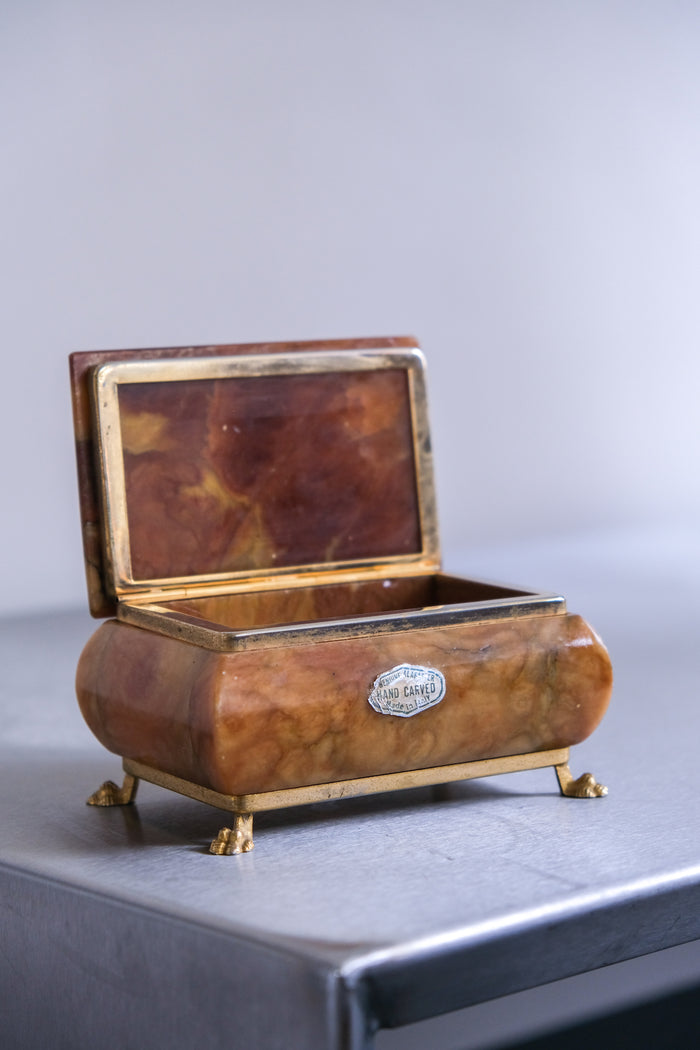 Alabaster box on lion paw feet
