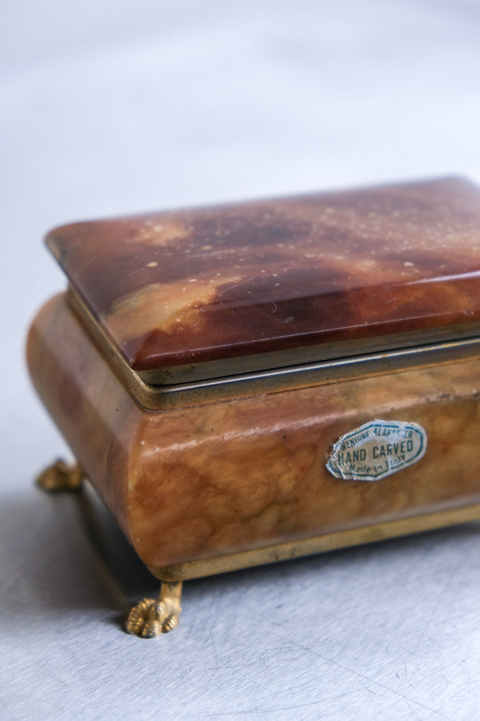Alabaster box on lion paw feet