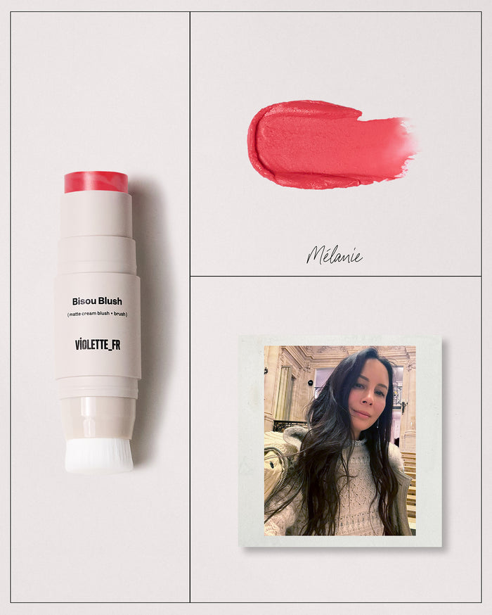 Bisou Blush (matte cream blush + brush) by VIOLETTE_FR in shade Mélanie, shown as a coral-pink stick, a swatch, and on a woman with deep skin tone.