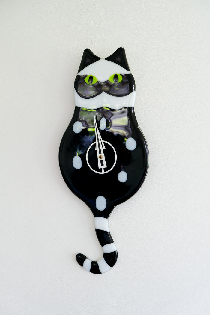 Glass cat clock
