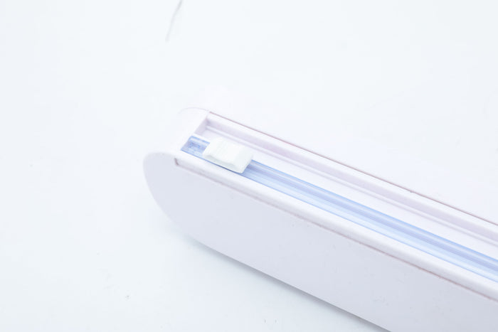 Plastic Wrap Cutter - Mount it somewhere for easy access