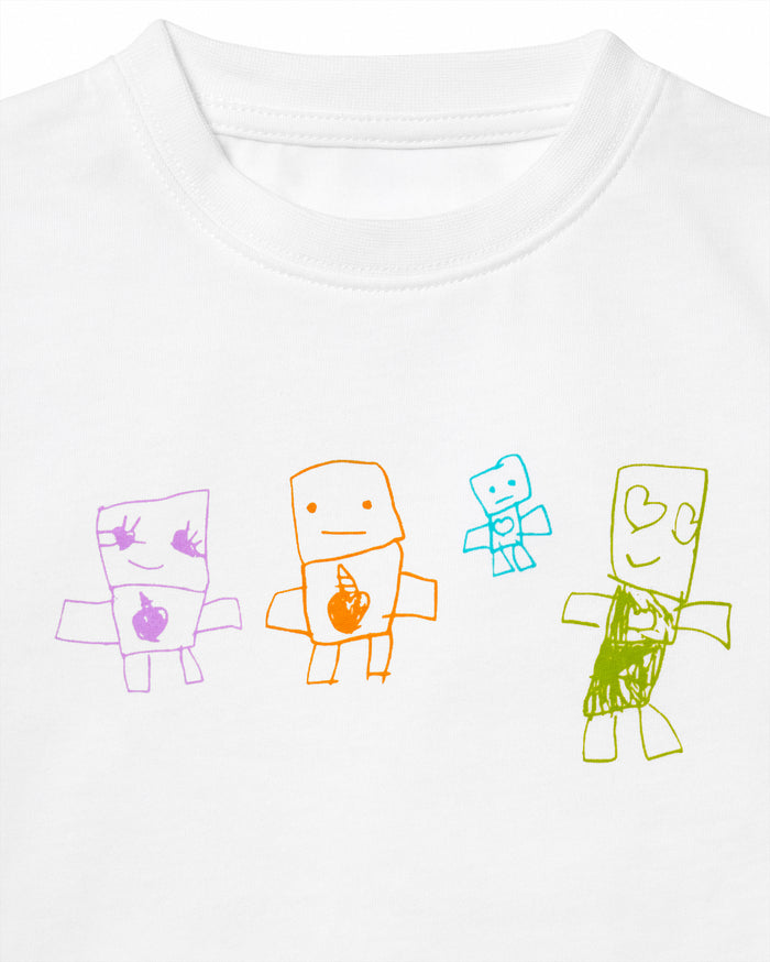 White t-shirt with a child's drawing of four colorful, blocky figures: a purple figure with a heart, an orange figure with a unicorn horn, a small blue figure with a heart, and a green figure with two hearts.