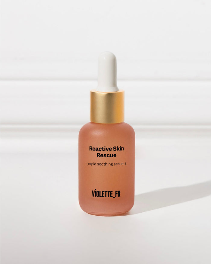 Reactive Skin Rescue (rapid soothing serum) by VIOLETTE_FR in a frosted peachy-orange dropper bottle.