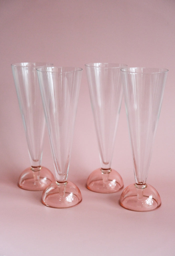 Set of four 90's flute glasses