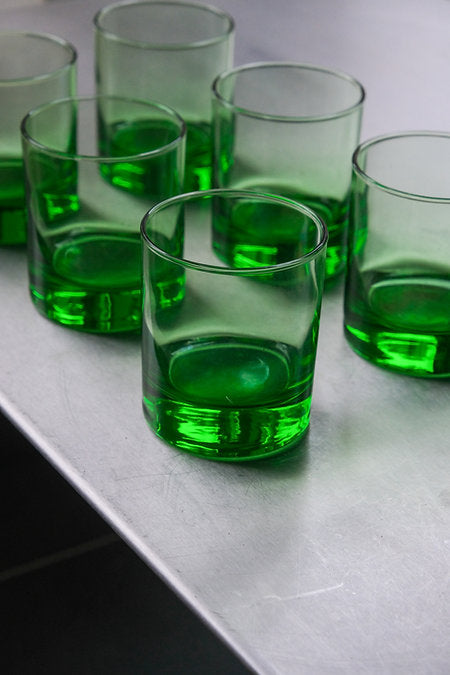 Set of six green tumbler glasses