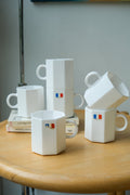Set of two Arcoroc mugs