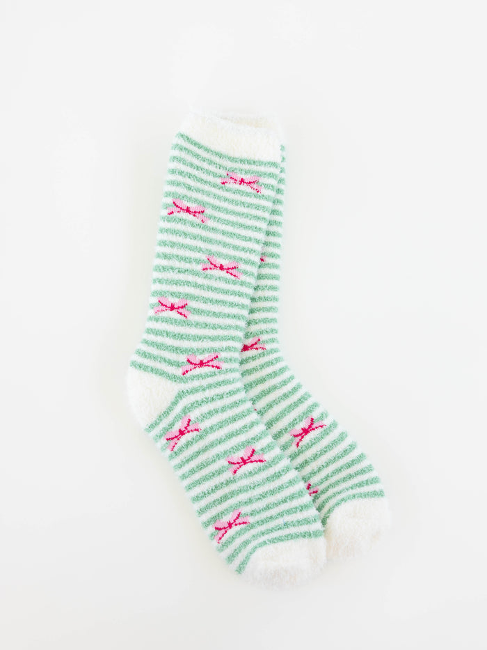World's Softest women's green and white striped socks with pink bows on a white background